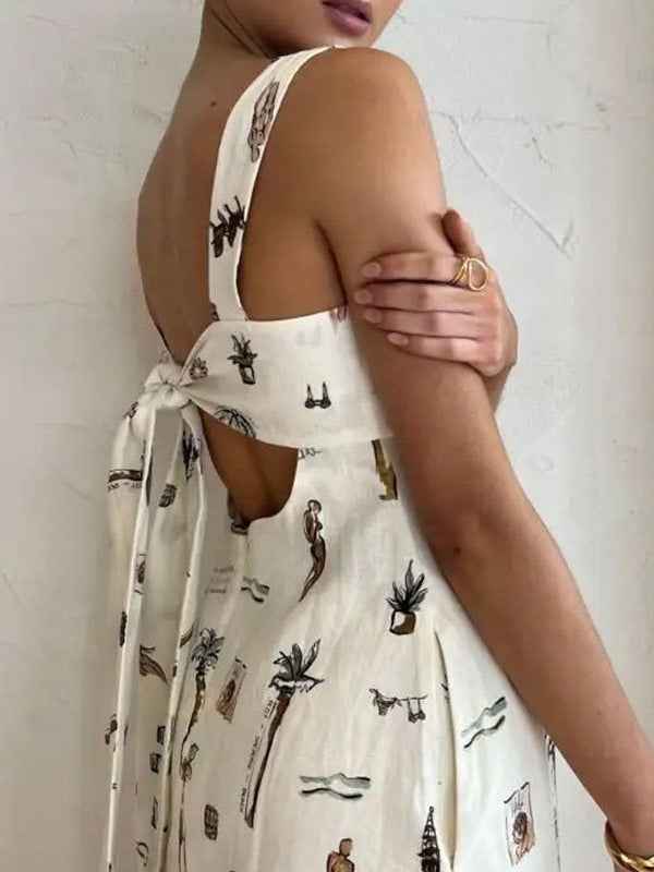 Fließendes ärmelloses Kleid mit grafischem Muster und eleganter Schleife