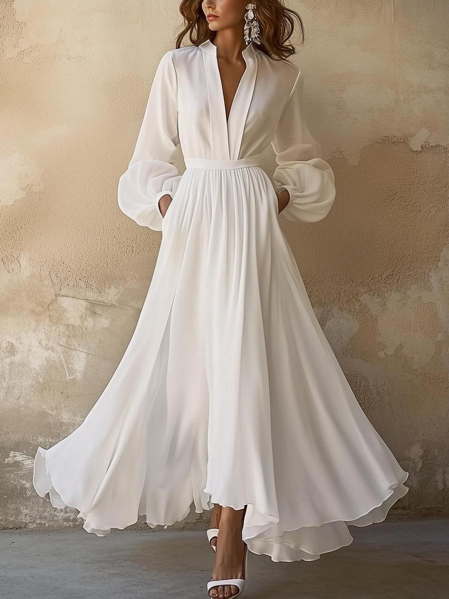 Elegantes langes Vintage-Kleid mit V-Ausschnitt in Weiß