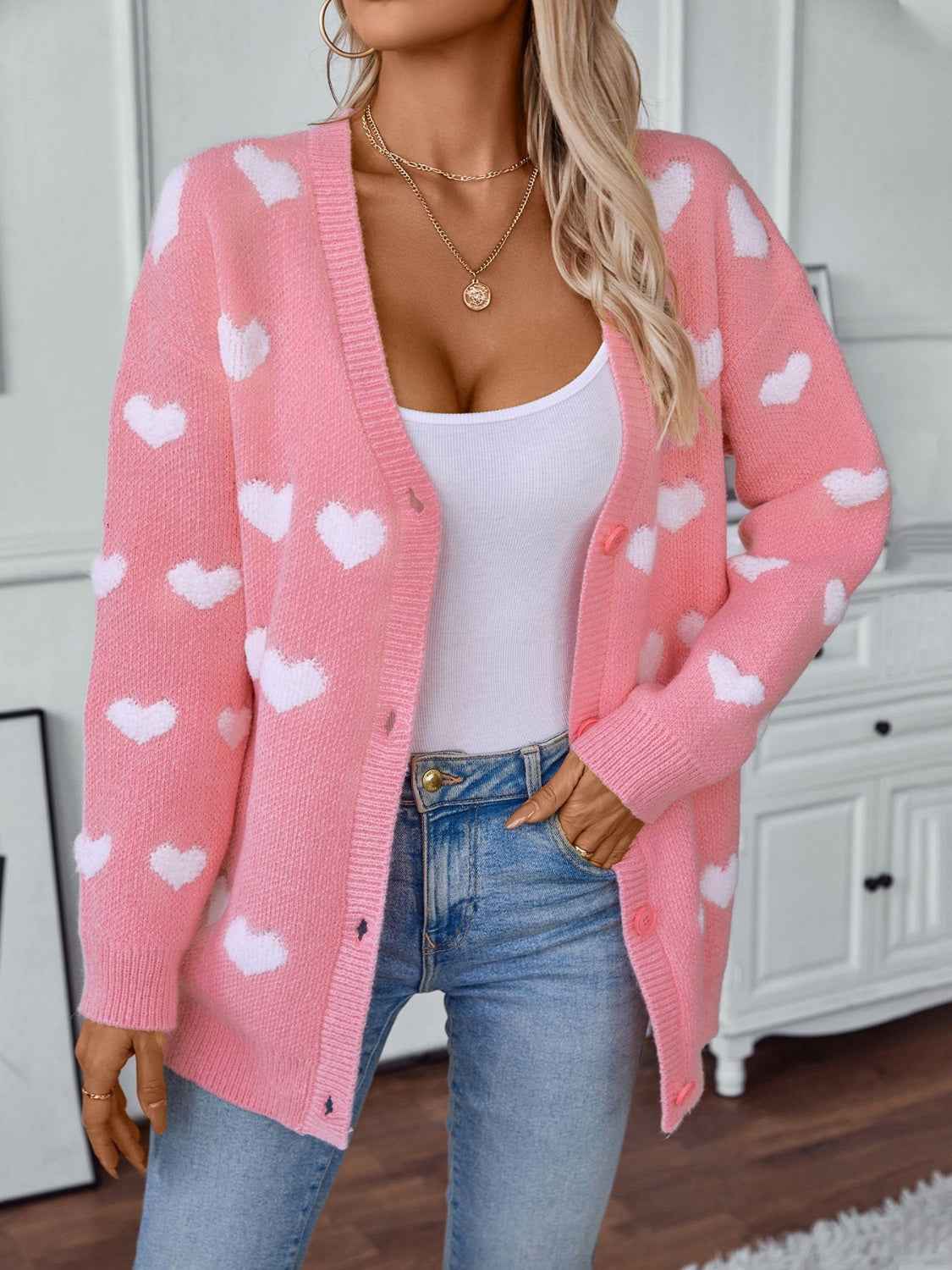 Herzbedruckte V-Ausschnitt-Strickjacke mit Knopfleiste und langen Ärmeln
