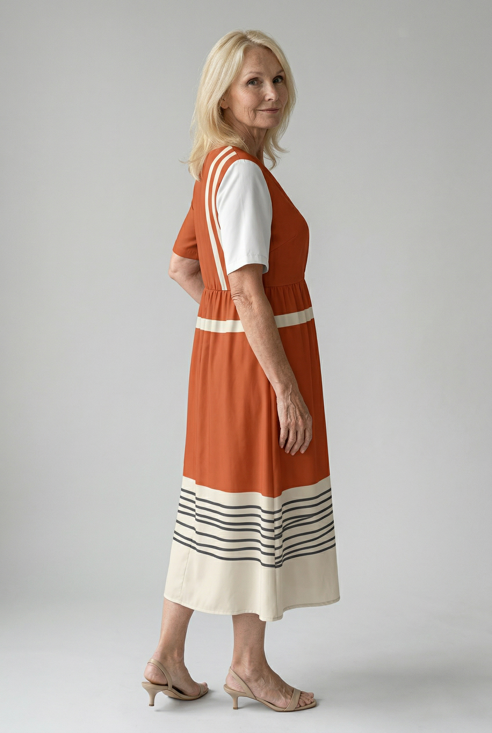 Elegantes terrakottakleid mit stilvollen grafischen Streifen Damen