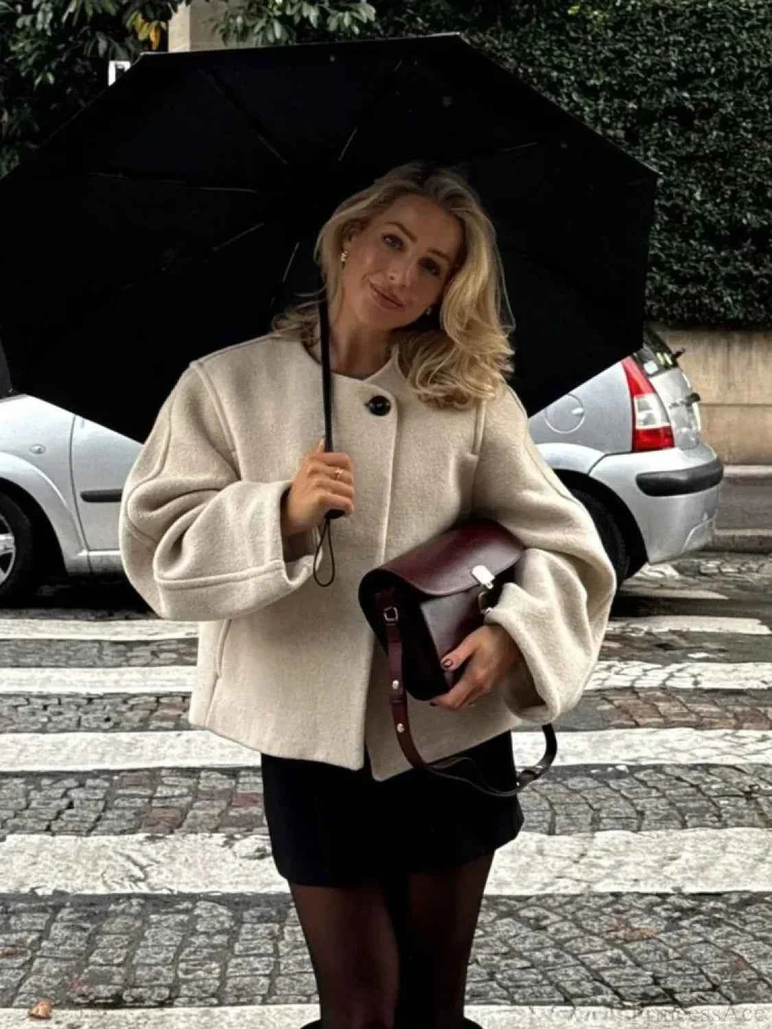 Eleganter lässiger Wollmantel mit Rundkragen und lockerer Passform