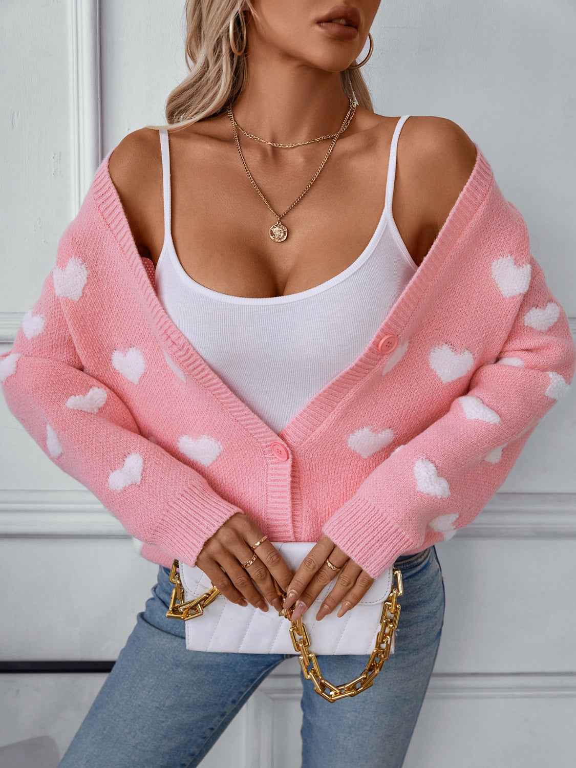 Herzbedruckte V-Ausschnitt-Strickjacke mit Knopfleiste und langen Ärmeln