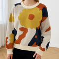 Maglia simile alla seta con elegante motivo floreale