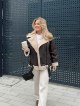 Elegant trendy winter coat with long sleeves for women