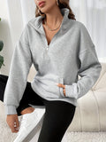 Maglione trendy e comodo con mezza cerniera donna
