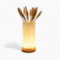 Elegant glaslampe med stilfuldt design og varmt atmosfærelys