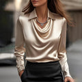 ROMINA – Elegant bluse i luksuriøs satin med delikat udskæring
