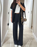 Top elegante e pantaloni con vita elastica