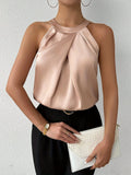 Bluse i satin AMIYAH med elegant halterneck-krave damer