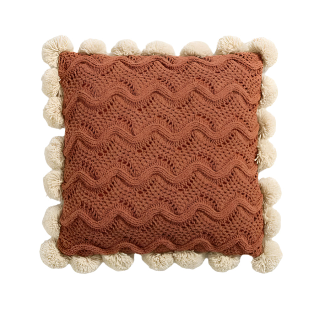 Domitia - Gemütliche gestrickte Kissenhülle mit Quasten im trendigen Boho-Stil