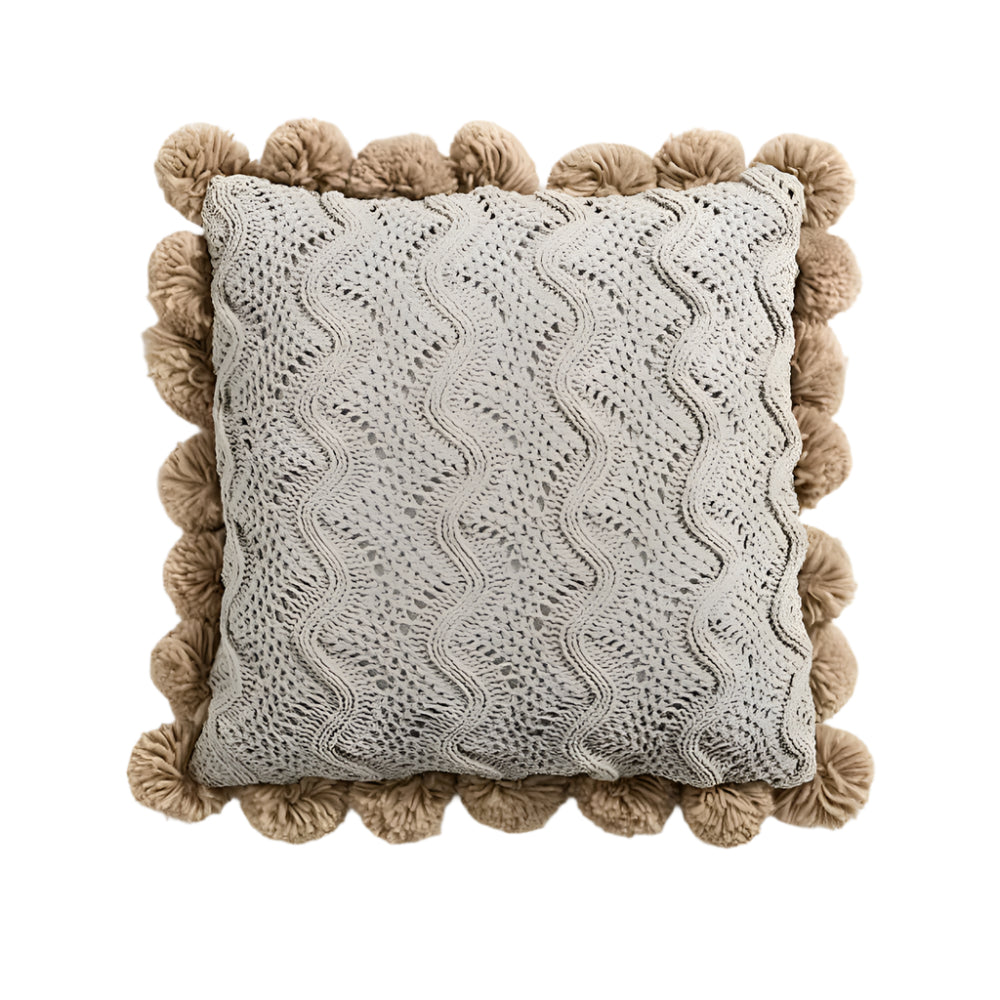 Domitia - Gemütliche gestrickte Kissenhülle mit Quasten im trendigen Boho-Stil