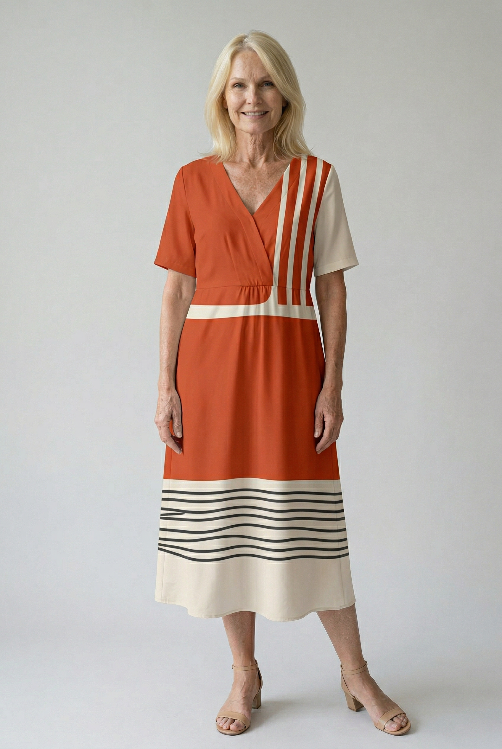 Elegantes terrakottakleid mit stilvollen grafischen Streifen Damen