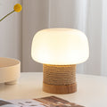 Stilosa lampada da tavolo LED minimalista moderna con elegante base in legno
