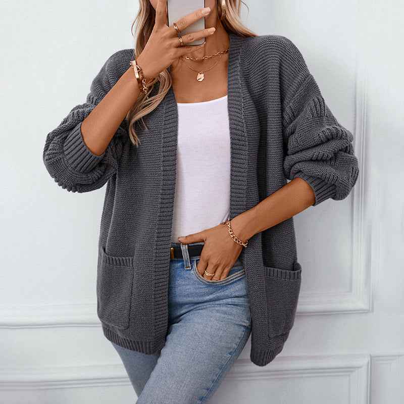 Locker geschnittene einfarbige Langarm-Strickjacke