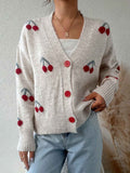 Elegant langærmet cardigan med knapper foran til damer