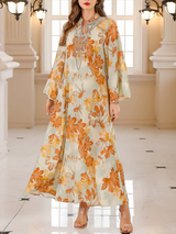 Lang bluse med ahornbladsmønster - sommerlig elegance og afslappet stil