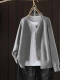Elegant perlemorsknap cardigan for et krævende look til damer