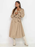 Trench coat lungo snello ed elegante da donna