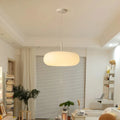 Moderne cremefarvet hængelampe i elegant krystalstilsdesign med hyggelig LED-belysning