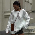 Maglione oversize da donna con nappine – comfort elegante per ogni occasione