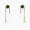 Væglampe med elegant guld og glas