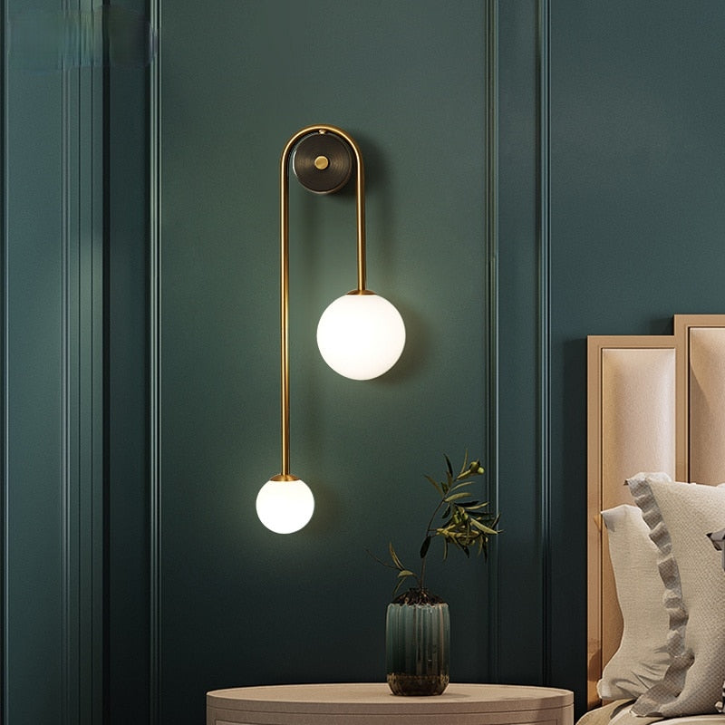 Wandleuchte mit elegantem Gold und Glas 2