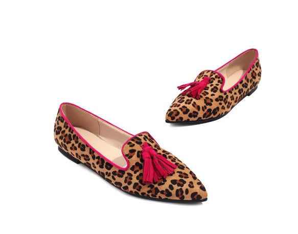 Elegant Pointed-Toe Loafers with Red Tassels