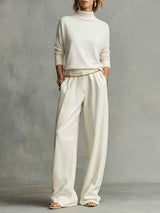 Comfortable turtleneck top and flowing wide pants set with waist chain  