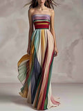 Abito maxi elegante con righe stampate, bustier con volant e spalle scoperte
