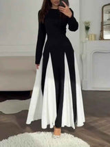 Chic black-and-white color-block round neck dress with tailored fit and long sleeves