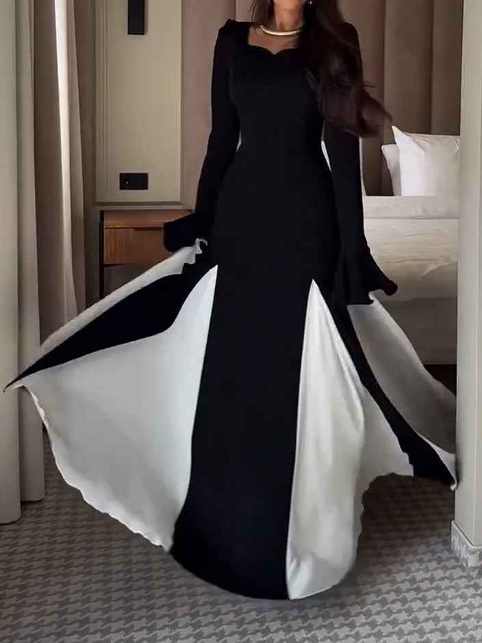 Elegantes und anspruchsvolles Maxi-Faltenkleid in Schwarz und Weiß mit langen Ärmeln