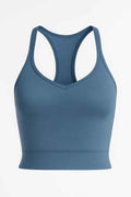 Top corto Spacedye da donna blu con schiena a racerback per yoga e fitness