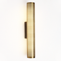 Aplique de pared dorado e iluminación LED en estilo Art Déco para una atmósfera elegante