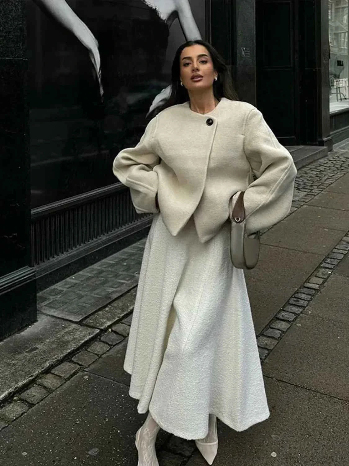 Eleganter lässiger Wollmantel mit Rundkragen und lockerer Passform