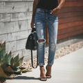 Trendige og stilfulde slidte jeans til et moderne look for damer