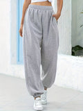 Comodi pantaloni da jogging elasticizzati a vita alta per un look elegante e confortevole