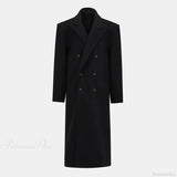 Double-breasted wool coat with shoulder epaulets and elegant lapels