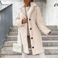 Elegante cappotto in lana tinta unita con cintura per uno stile raffinato