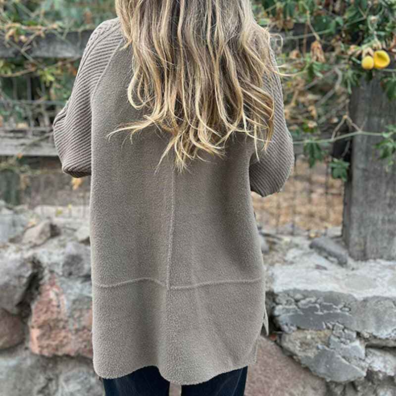 Sola - Zeitlose Eleganz in einem warmen Mantel mittlerer Länge